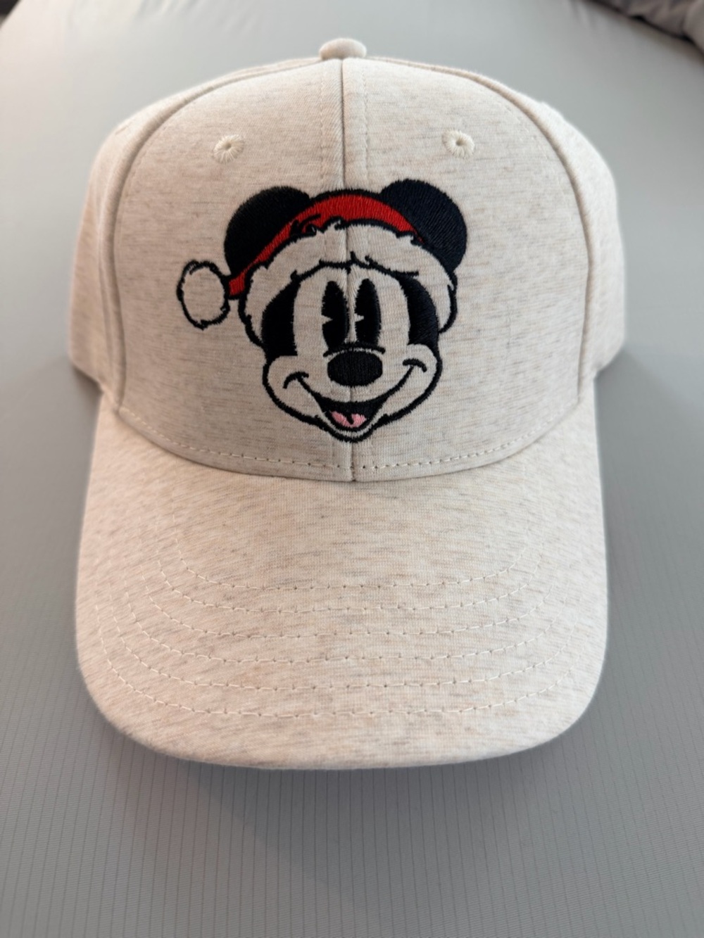 Disney Light Cream Baseball Cap with Embroidered Mickey in Red Santa Hat